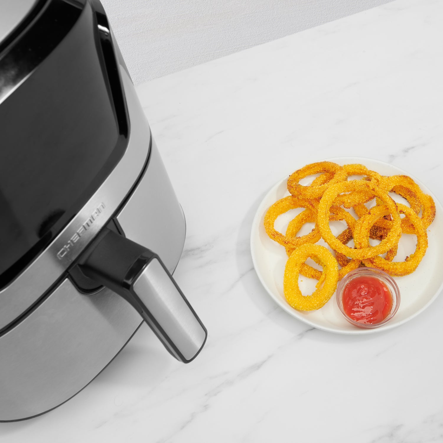 https://chefman.com/cdn/shop/products/turbo-fry-touch-digital-air-fryer-large-stainless-steel-6.jpg?v=1692314735&width=1946